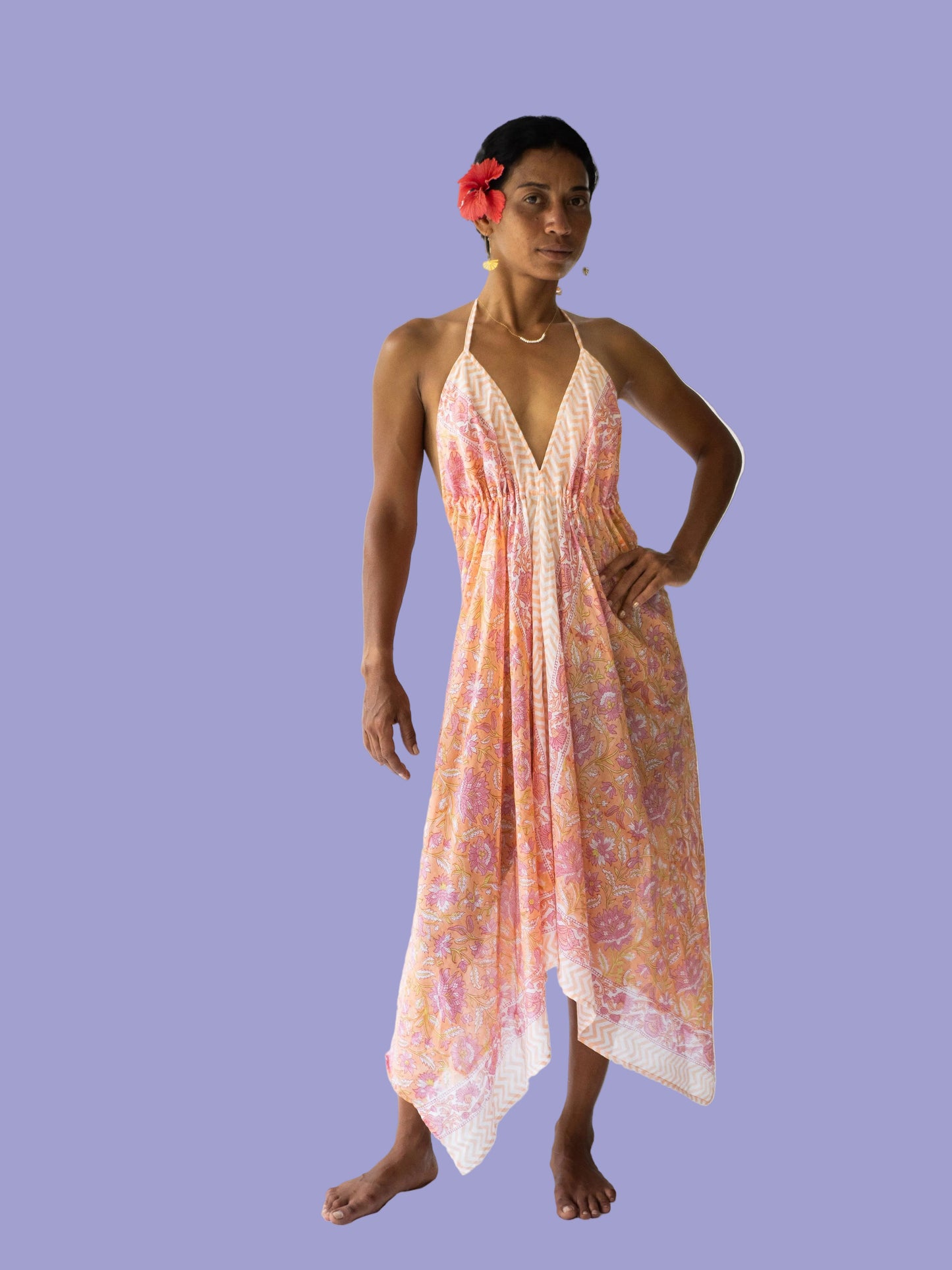 Woman wearing a floral dress on a white background