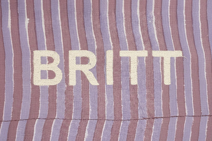 Striped fabric with floral patterns at the top and bottom