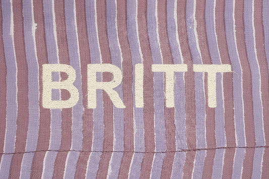 Striped fabric with floral patterns at the top and bottom